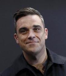 Téléchargez gratuitement les sonnerie Robbie Williams pour Nokia 6265.